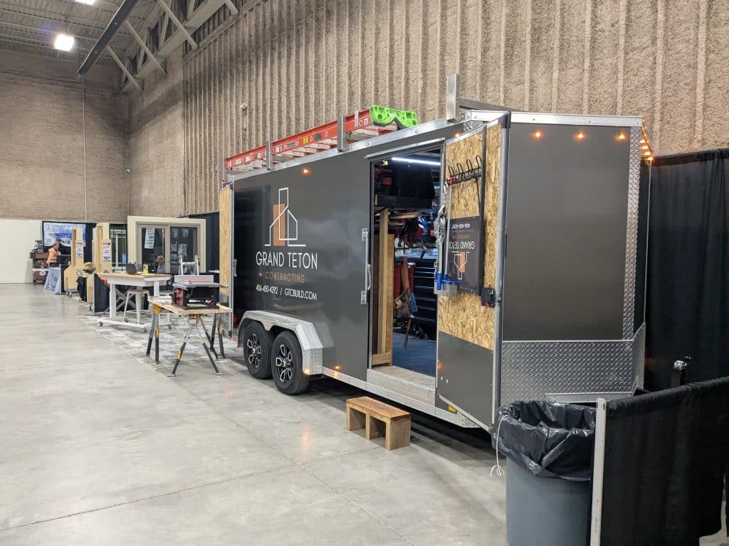 Grand Teton Contracting trailer at a home show, promoting their contracting services.